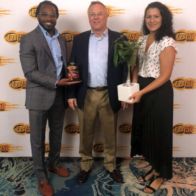 CBA’s Damian Barnes, David Brownlee, LEED AP, and Raquel Oquendo, AIA accepting the award at the Orlando Business Journal’s Fast 50 Awards Luncheon on September 8, 2022.