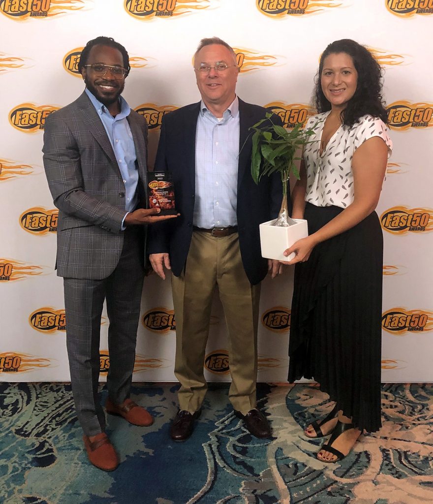 CBA’s Damian Barnes, David Brownlee, LEED AP, and Raquel Oquendo, AIA accepting the award at the Orlando Business Journal’s Fast 50 Awards Luncheon on September 8, 2022.
